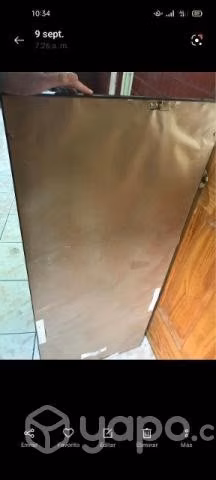Espejo borde de madera