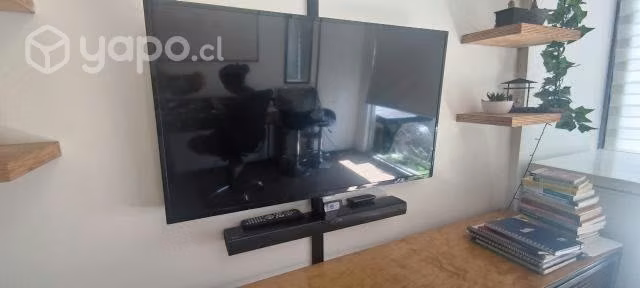 Smart tv + barra de sonido + bases