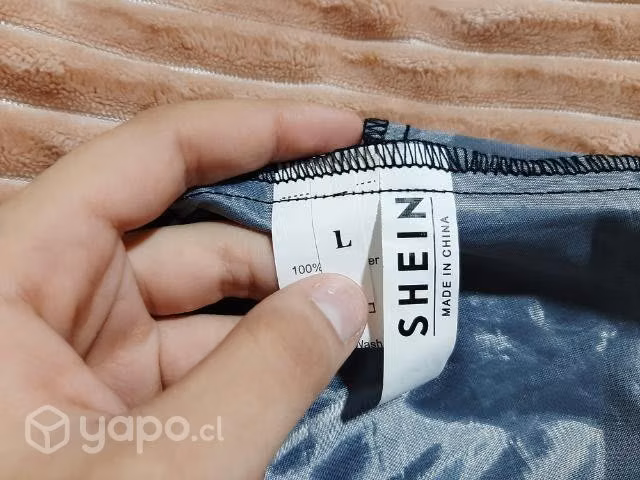 Ropa usada como nueva y nueva