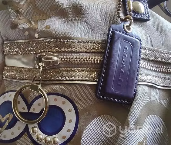 Cartera Coach original Monogram