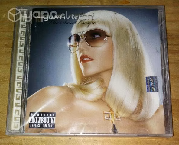 Gwen Stefani - The Sweet Escape "2006" 13 Cancione