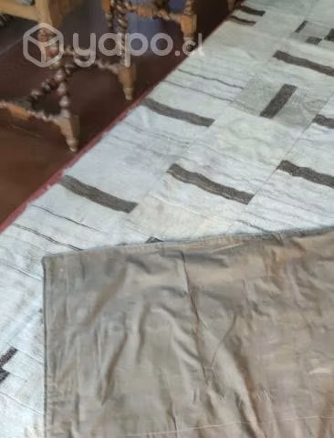 La alfombra patch work del Consorcio Persa. Impeca