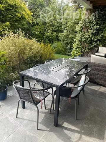Comedor mármol negro com sus 6 sillas poco uso