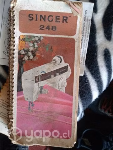 Manual antiguo de máquina de coser singer