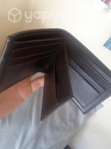 Billetera nueva y audífonos motorola