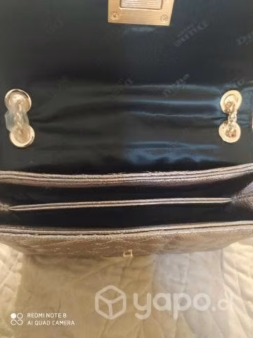 Linda cartera marca Dune, nueva