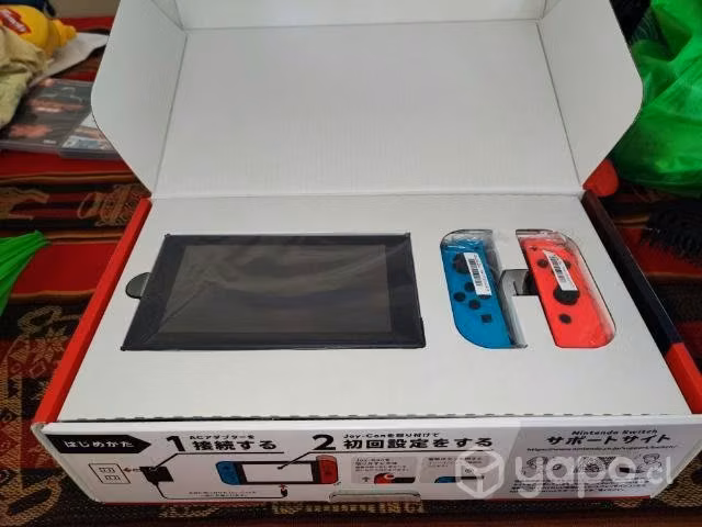 Nintendo Switch + 3 juegos + estuche de Mario bros