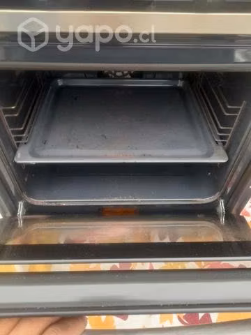 Horno y cosina marca teka en excelente estado