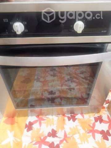 Horno y cosina marca teka en excelente estado