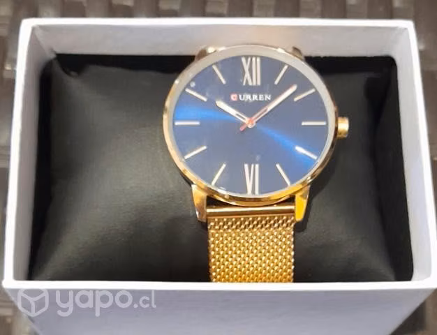 reloj dorado - Imagen 2