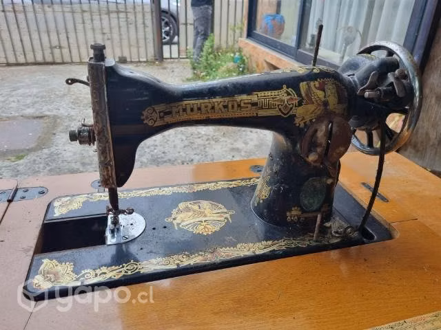 Maquina de coser murkos