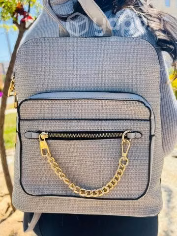 Mochila y carteras de mujer