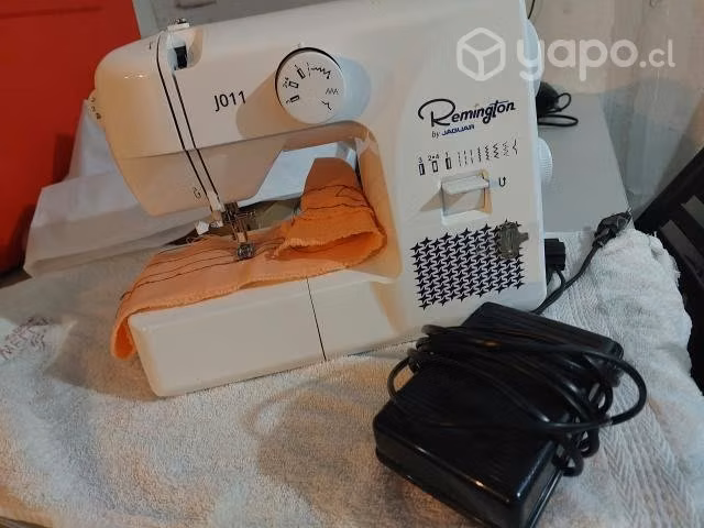 Maquina de coser . Remigton
