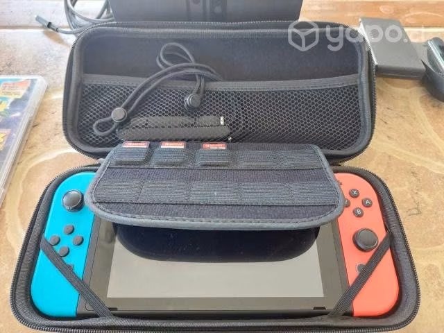 Consola Nintendo Switch con juegos y accesorios