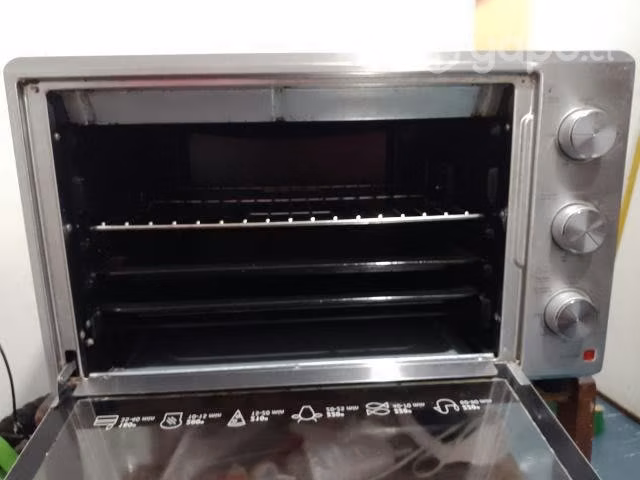 Por motivo de viaje,horno eléctrico