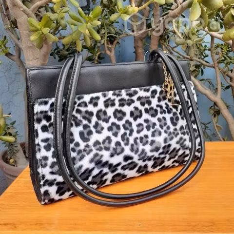 Cartera cuero animal print LAmour Parfait NUEVA