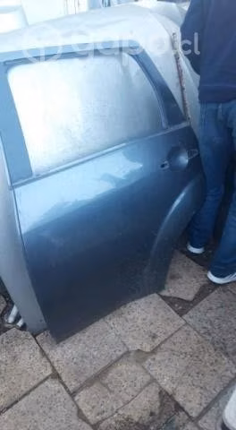 Puerta trasera lh Mitsubishi oulander 2011