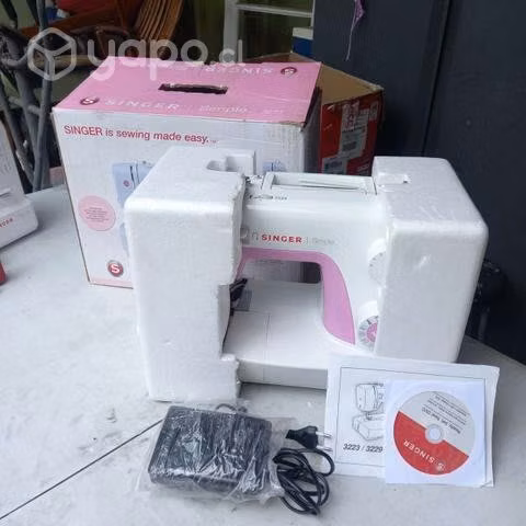 Maquina de coser Singer