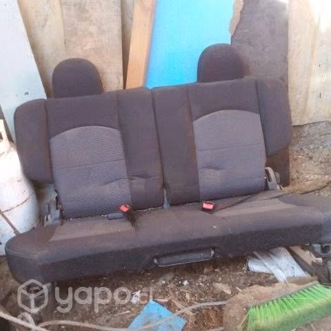 Asiento tracero