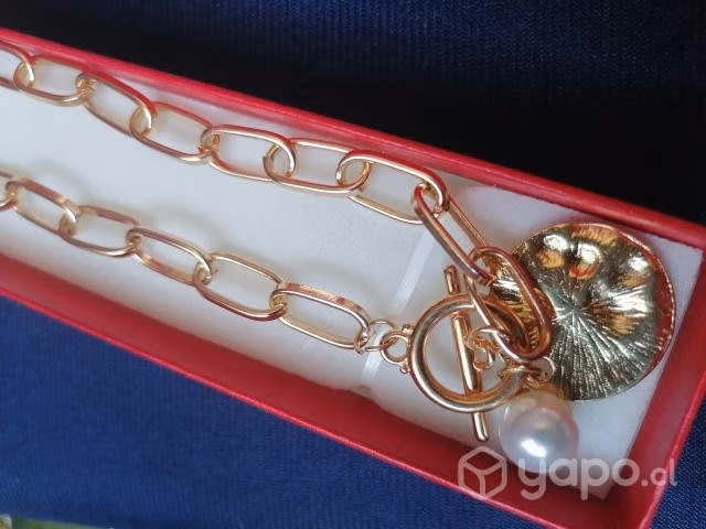 Set collar pulsera fantasía fina.