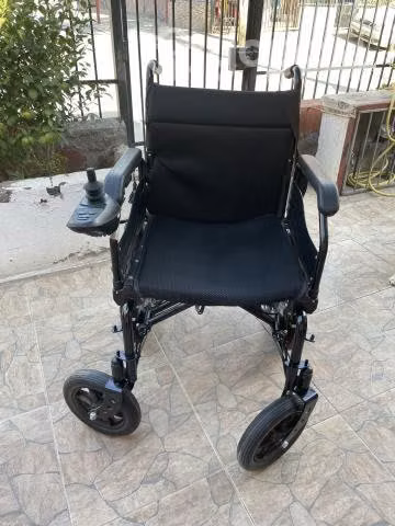 Silla de ruedas eléctrica y cojín antiescaras