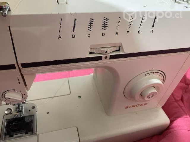 Máquina de coser marca singer