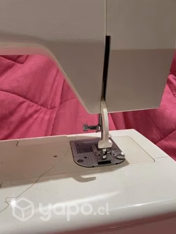 Máquina de coser marca singer