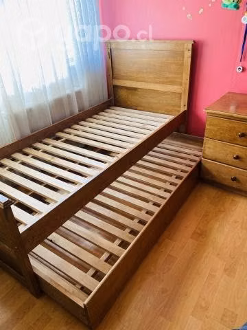 Cuna adaptable a cama nido.