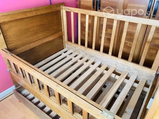 Cuna adaptable a cama nido.