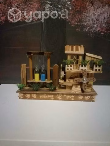 Casita de música con arena