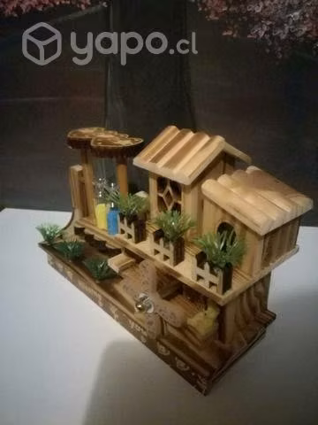 Casita de música con arena