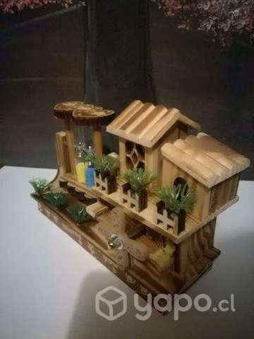 Casita de música con arena