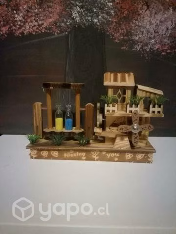 Casita de música con arena