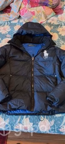 Polo de plumas original