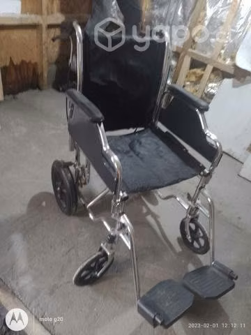 Silla de ruedas impecable