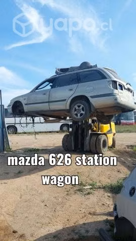 Mazda 626 puerta trasera izquierda año 2000
