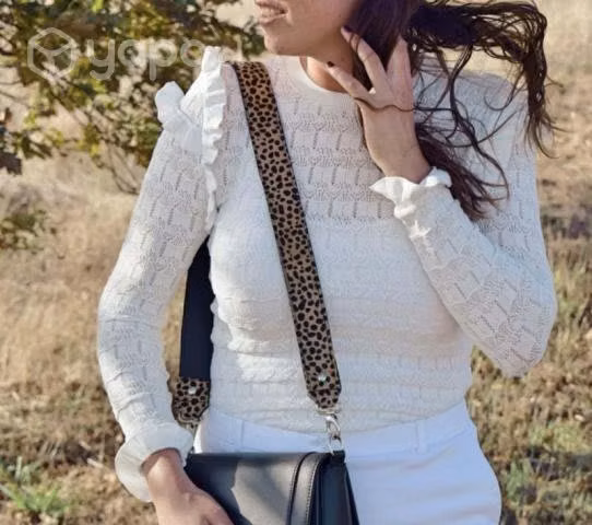Chaleco ZARA con vuelos