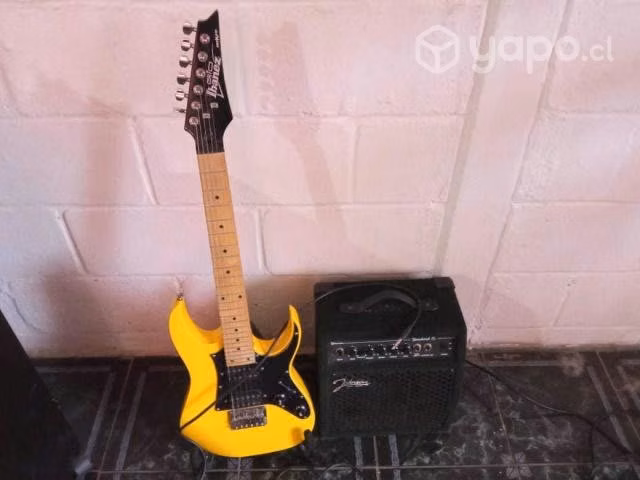Guitarra elecrtica ibañez +amplificador y clabes