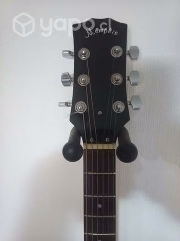Guitarra eléctrica con amplificador