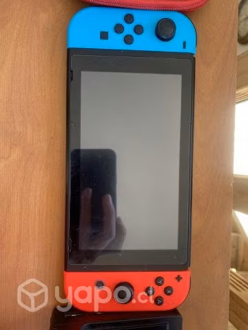 Nintendo switch full equipada con 3 juegos. Muy po