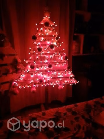 Sillones y pinitos de navidad en madera.