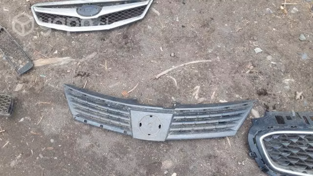 Mascara delantera original Nissan tiida 2013
