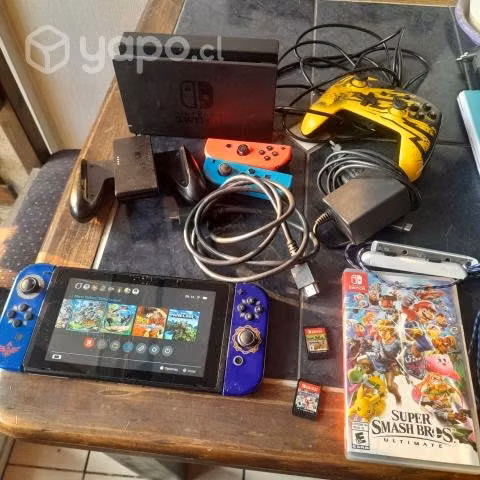 Consola Nintendo swich + 3 juegos + palancas extra