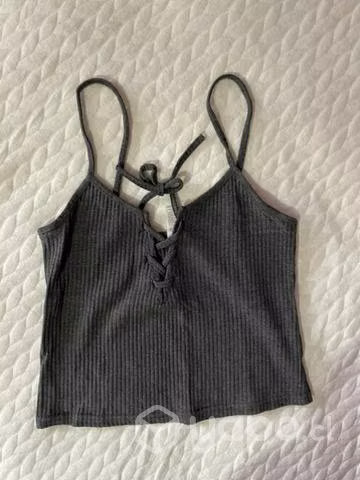 Traje de baño y poleras mujer