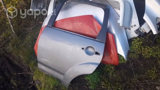 Puerta trasera lh Mitsubishi oulander 2010