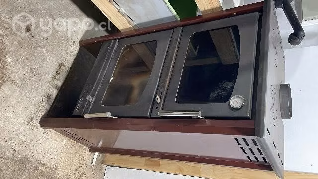 Estufa casi nueva con horno y caño