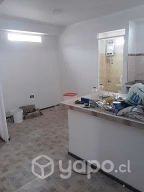 "edificio de 4 pisos, 4 departamentos"