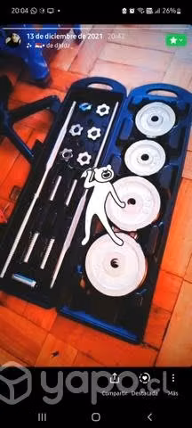 Barra + 50 kg en discos