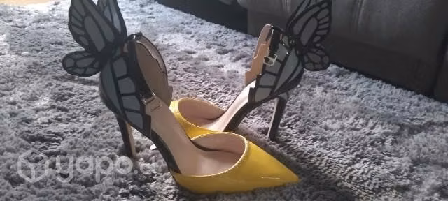 Hermoso zapatos estilo mariposa