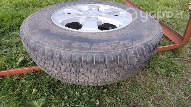 Llanta original de mitsubishi L200 más neumático n